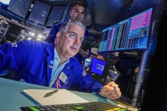 Wall Street veers upward after Trump softens his criticism of China