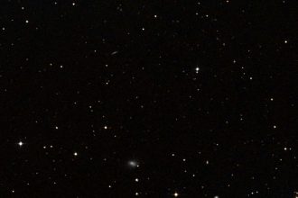 A tiny nearby galaxy is home to a shockingly enormous black hole