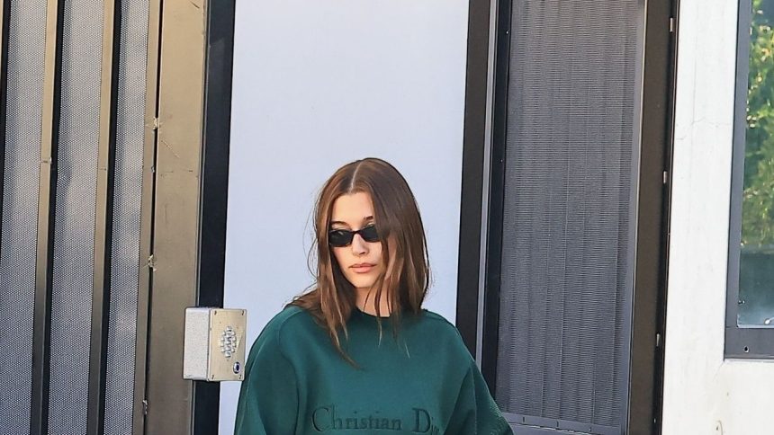 Hailey Bieber’s Slogan Sweater Makes a Simple (But Celebrity-Backed) Statement Hailey Bieber’s Slogan Sweater Makes a Simple (But Celebrity-Backed) Statement