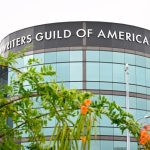 WGA Says Warner Bros. Merger Would Be a Disaster for Writers WGA Says Warner Bros. Merger Would Be a Disaster for Writers