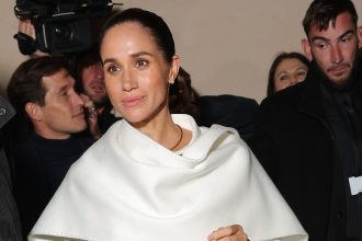 Meghan Markle Swaps White Pantsuit for Black Gown at Paris Fashion Week