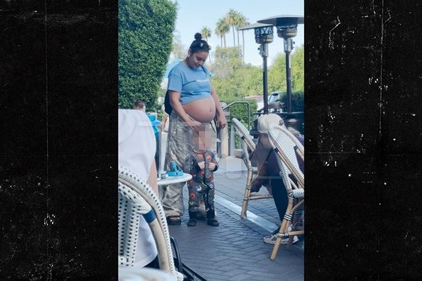Vanessa Hudgens Shows Off Bare Baby Bump with Husband Cole Tucker