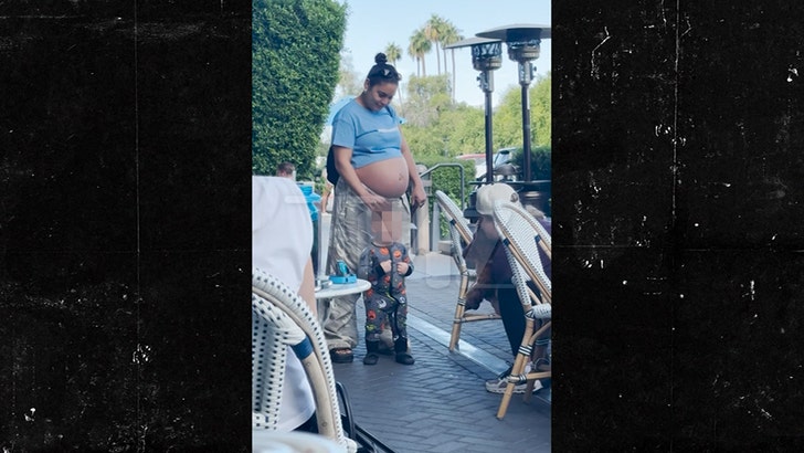 Vanessa Hudgens Shows Off Bare Baby Bump with Husband Cole Tucker