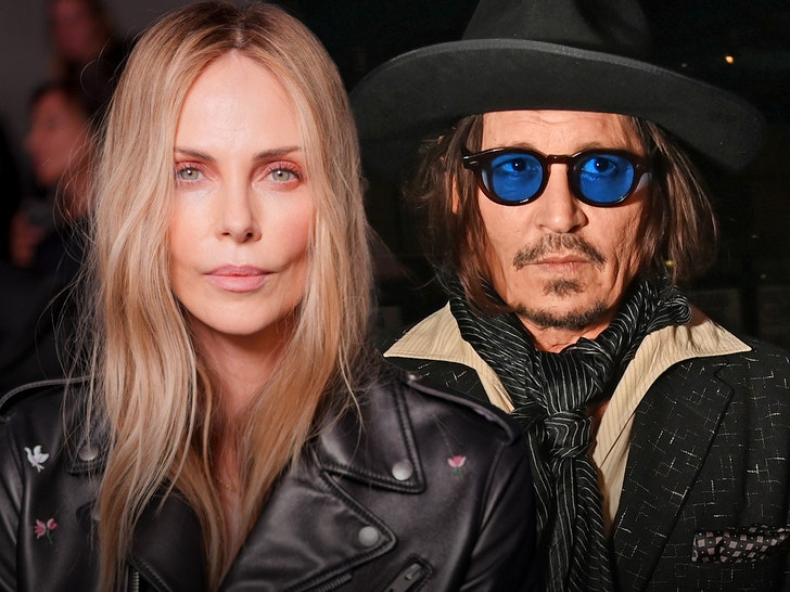 Charlize Theron Seemingly Gives Cold Shoulder to Johnny Depp at Dior Show