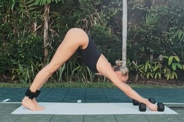 Candice Swanepoel Hits Downward Dog in Thong Leotard