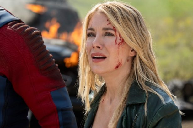 ‘Peacemaker’ Star Jennifer Holland On Harcourt’s Romantic Journey and the ‘Fun’ of Her Fight Scenes: ‘I Got to Throw “Mein Kampf” at a Nazi’s Face’