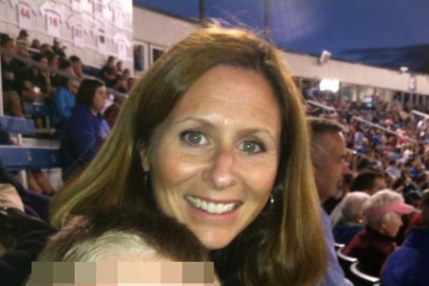 Astronomer CEO Andy Byron, wife spotted wearing wedding rings, enjoying beach outing months after Coldplay kiss cam scandal: report