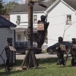Homeowner arrested after putting up twisted Halloween display depicting local officials in body bags