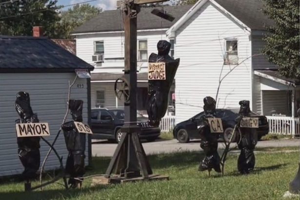 Homeowner arrested after putting up twisted Halloween display depicting local officials in body bags