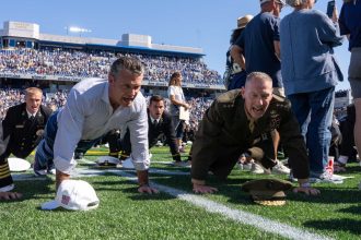 Pete Hegseth helps set world record at Navy football game for most people doing pushups at same time