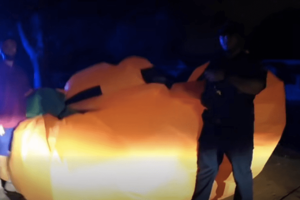 Wild video captures police struggle to capture giant runaway inflatable pumpkin