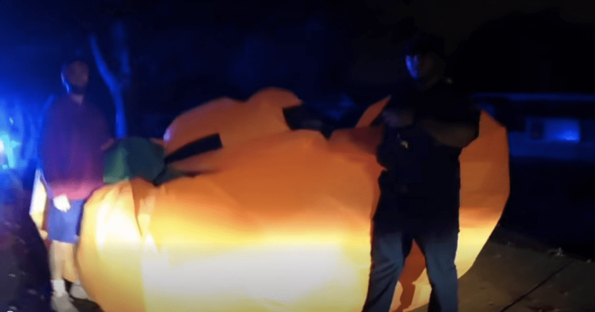 Wild video captures police struggle to capture giant runaway inflatable pumpkin