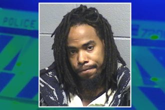 15 years for carjacking a man while Chicago cops shined their squad car spotlight on him