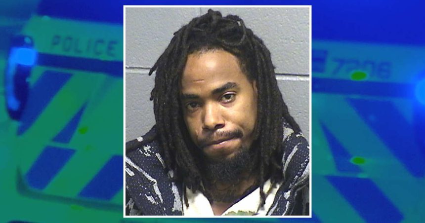 15 years for carjacking a man while Chicago cops shined their squad car spotlight on him