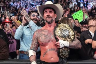 CM Punk is the new World Champion now. [Image credits: WWE.com]