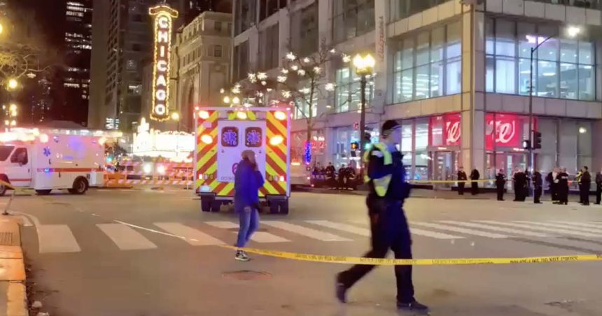 9 people, mostly children, shot as holiday crowd turns violent in the Loop; 1 dead