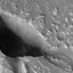 Caves carved by water on Mars may hold signs of past life