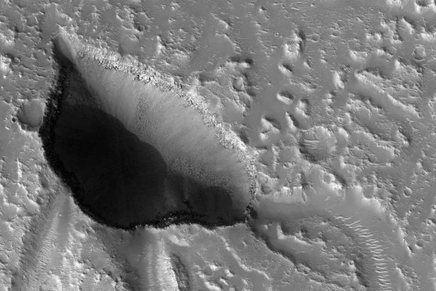 Caves carved by water on Mars may hold signs of past life