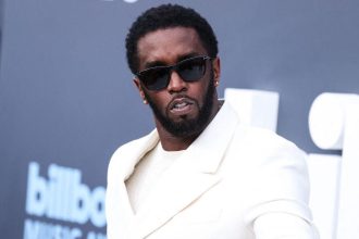 Diddy Looks Unrecognizable With Gray Hair & Beard In First Prison Videos