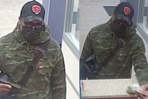 FBI seeks man who displayed gun during suburban bank robbery