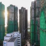 Hong Kong mourns victims of fire that killed 128 and counting