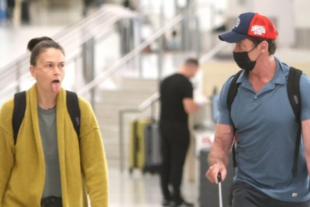 Hugh Jackman and Sutton Foster Keep It Flirty at LAX Airport