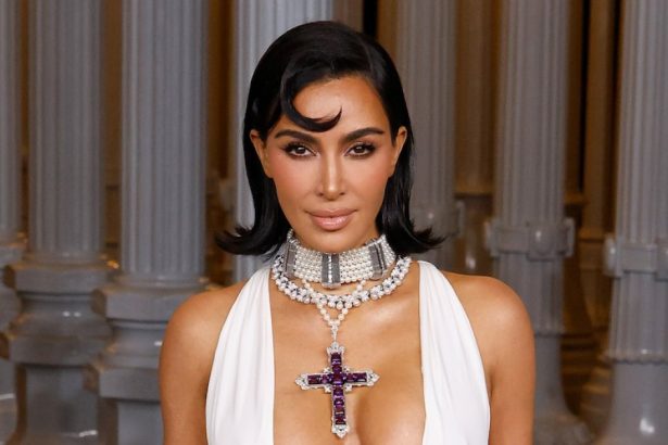Kim Kardashian Stuns in Naked Dress as She Poses in Sheer Lace