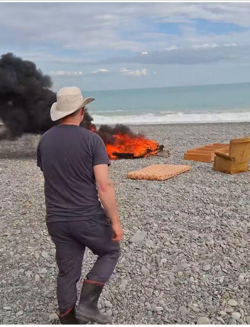 Man fined after being filmed burning rubbish on beach