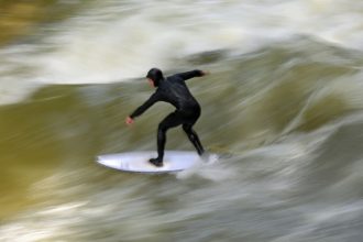 Munich’s Eisbach wave has flattened, frustrating surfers : NPR