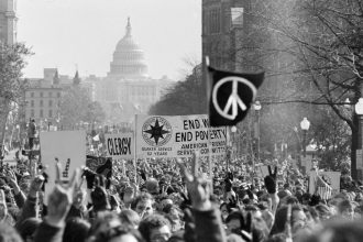 November 15, Protesters march against Vietnam War
