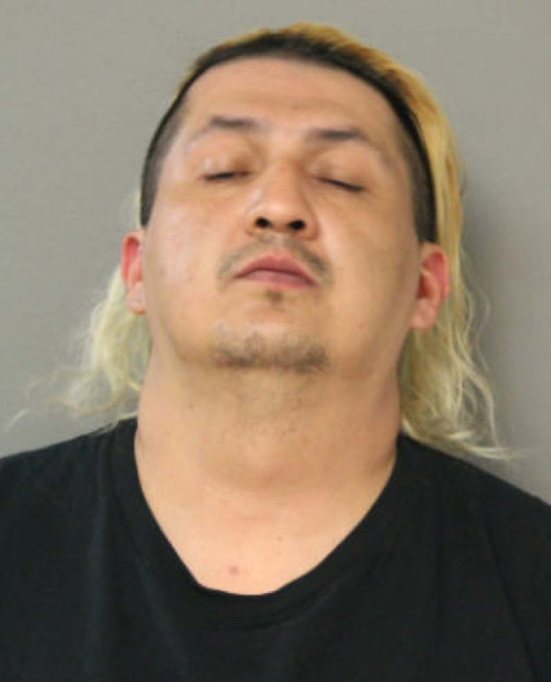 Paroled home invader sold guns and drugs to undercover agents in Portage Park: feds