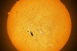 Skydiver Caught Transiting The Sun in ‘Preposterous (But Real)’ Photograph : ScienceAlert
