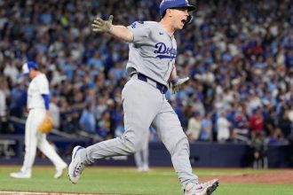 Smith’s homer in 11th lifts Dodgers over Blue Jays 5-4 to become first repeat champion in 25 years : NPR