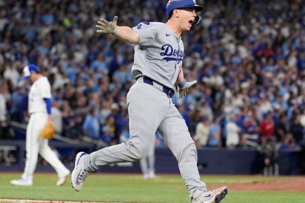 Smith’s homer in 11th lifts Dodgers over Blue Jays 5-4 to become first repeat champion in 25 years : NPR