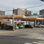 Suspect detained after woman is shot during altercation at Edgewater gas station