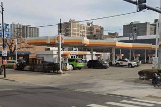 Suspect detained after woman is shot during altercation at Edgewater gas station