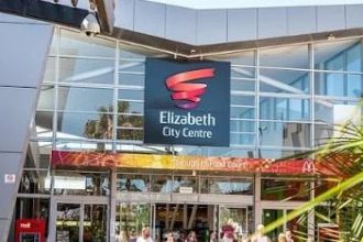 Teen fights for life after Black Friday brawl at Adelaide mall