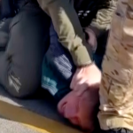 Video Shows Immigration Agent Punching Restrained Man After Car Collision Turns Into Confrontation