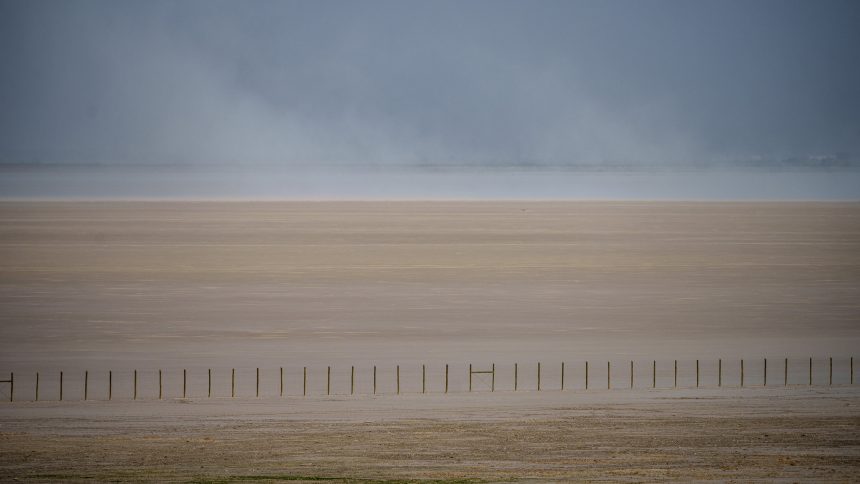 A drying Great Salt Lake is spewing toxic dust. It could cost Utah billions.