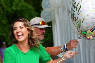 Amanda Balionis rocks red and black in advanced ‘festival dump’ ahead of Christmas