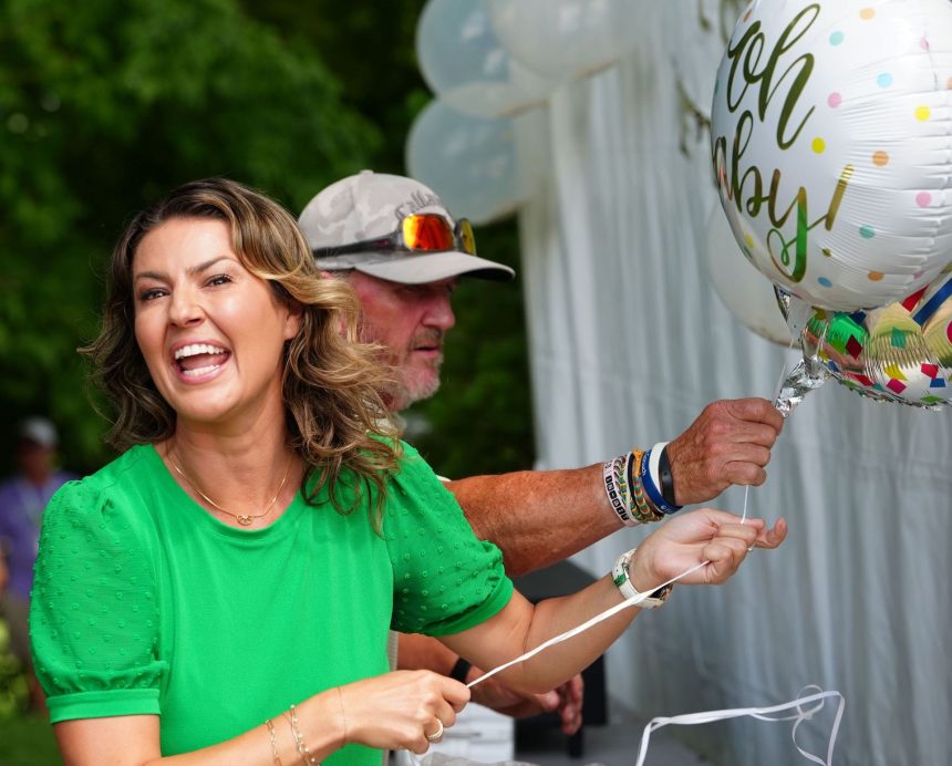 Amanda Balionis rocks red and black in advanced ‘festival dump’ ahead of Christmas