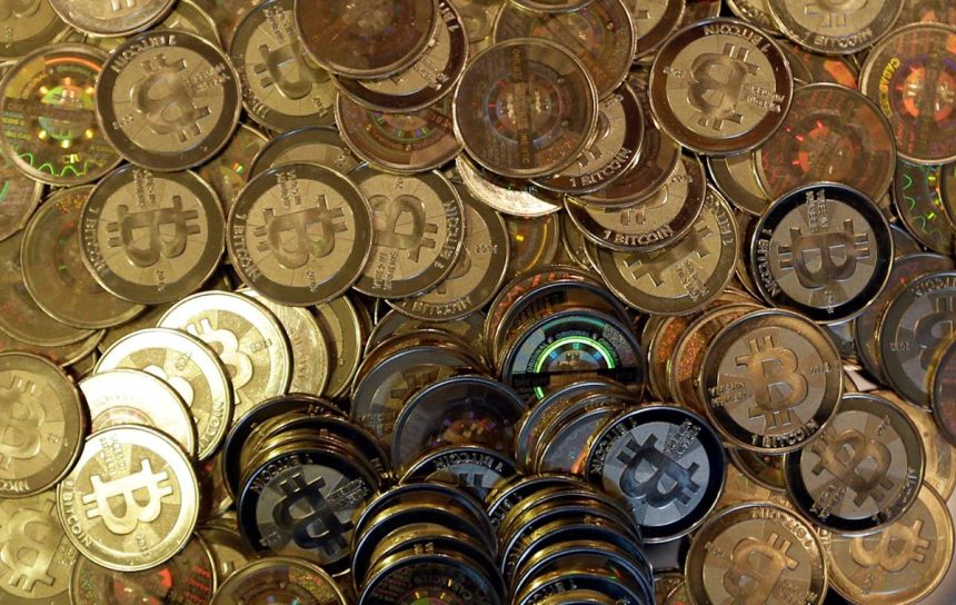 Bitcoin briefly dips below ,000 in crypto rout