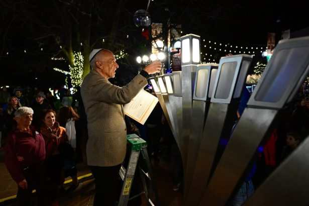 Boulder Jewish community lights Menorah on site of Pearl Street attack