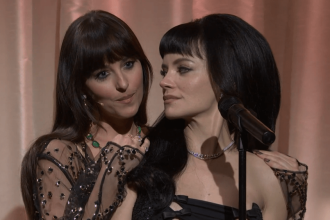 Dakota Johnson Plays ‘Madeline’ During Lily Allen’s SNL Performance