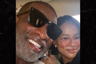 Deion Sanders Cozies Up With Karrueche Tran In First Instagram Pic Together