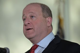 Denver judge dismisses Gov. Jared Polis’ latest attempt to end lawsuit