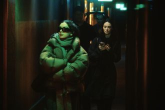 Charli XCX Sends Up Brat Summer in the Latest Trailer for ‘The Moment’