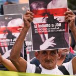 Honduras seeks arrest of ex-President Hernández after Trump pardon : NPR