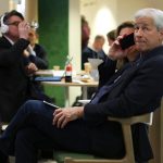 Jamie Dimon is now taking advice from Jeff Bezos and Condoleezza Rice