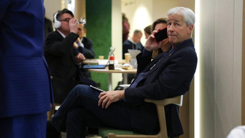 Jamie Dimon is now taking advice from Jeff Bezos and Condoleezza Rice